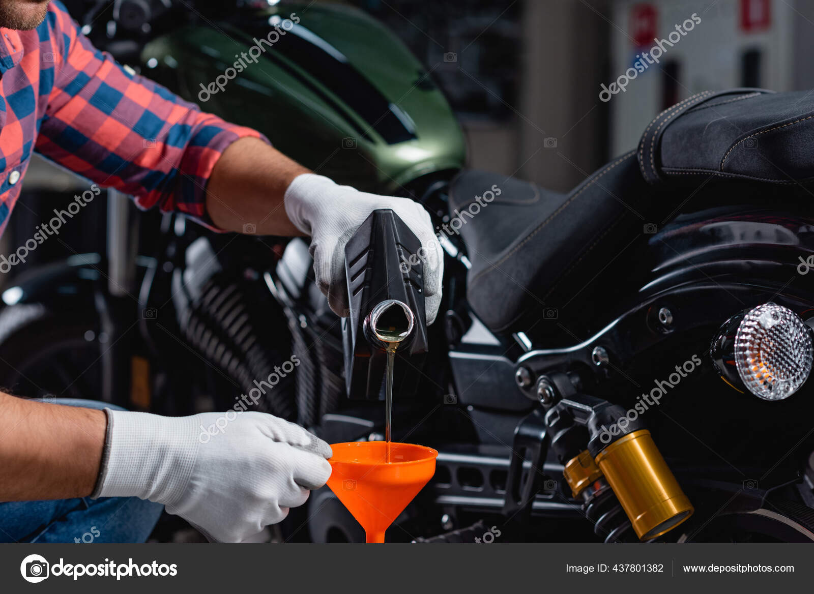 Cropped View Mechanic Pouring Engine Oil Funnel Motorbike Blurred