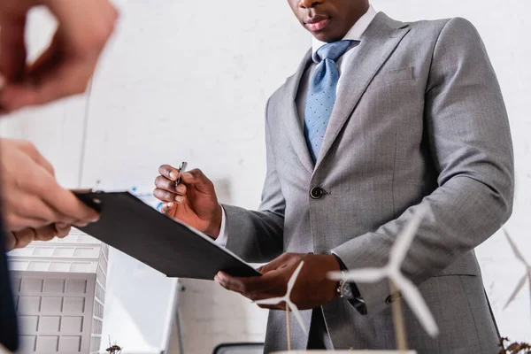 Partial View African American Businessman Holding Pen Clipboard Business Partner — Stock Photo, Image