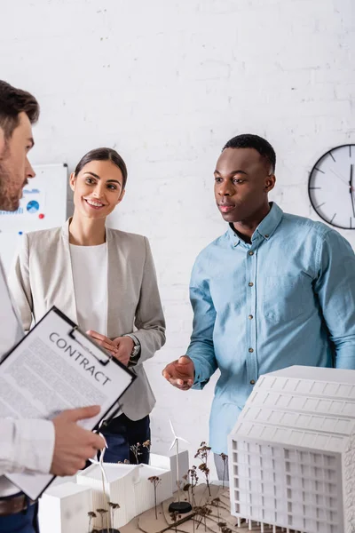 Businessman Holding Contract Multicultural Business Partners Models Building Green Power — Stock Photo, Image