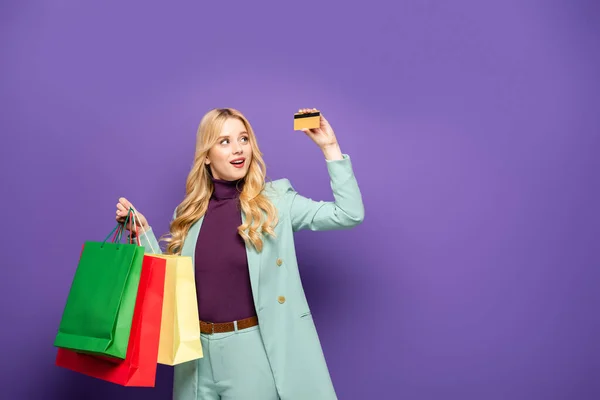 Blonde Young Woman Fashionable Turquoise Blazer Shopping Bags Credit Card — Stock Photo, Image