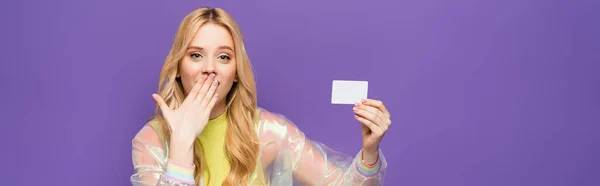 Shocked Blonde Young Woman Colorful Outfit Holding Blank Card Isolated — Stock Photo, Image