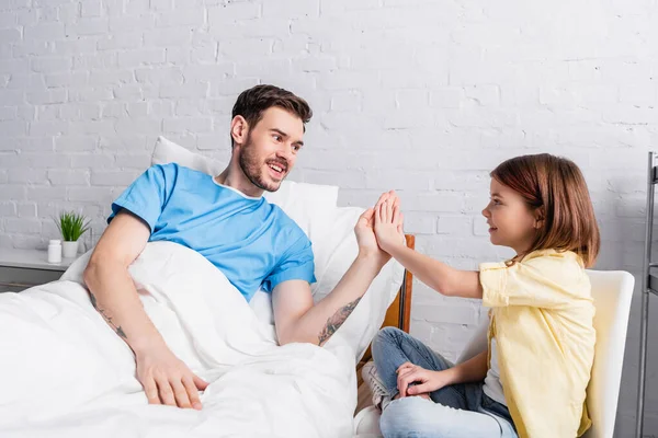 Cheerful Man Giving High Five Happy Daughter Hospital — Stock Photo, Image