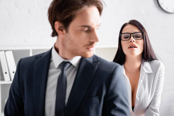 Sexy Brunette Businesswoman Eyeglasses Seducing Young Colleague Blurred Foreground — Stock Photo, Image