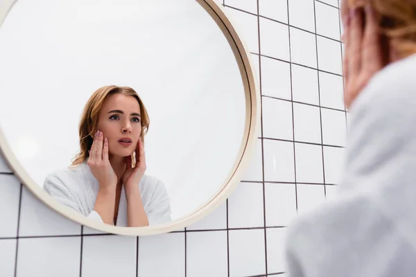 Woman Touching Face While Looking Mirror Bathroom — Stock Photo, Image