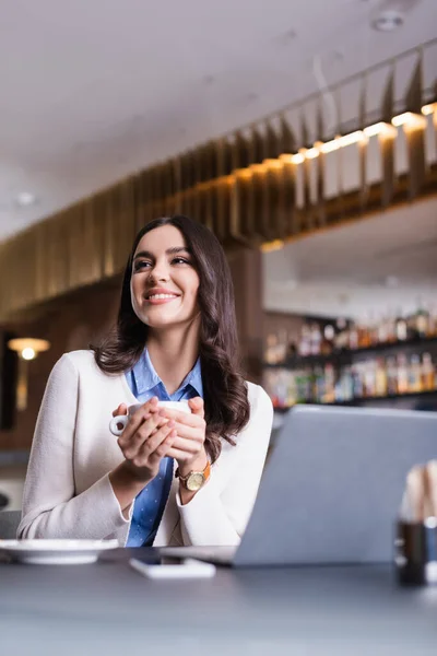 Cheerful Freelancer Looking Away While Holding Cup Coffee Restaurant — Stock Photo, Image