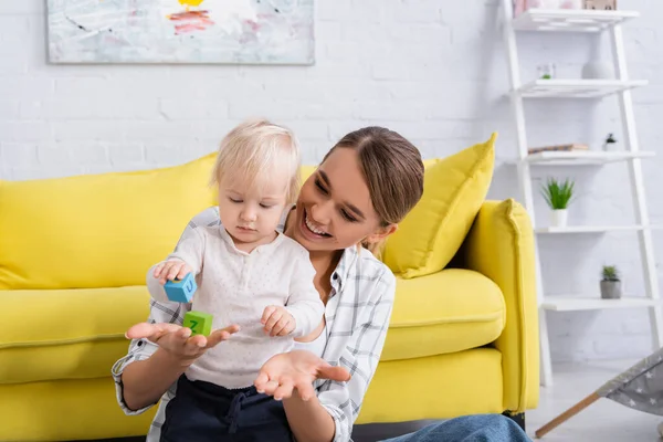 Joyful Woman Holding Toy Cube Little Son Home — Stock Photo, Image