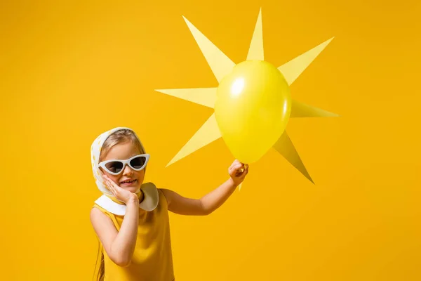 Happy Girl Headscarf Sunglasses Decorative Sun Balloon Isolated Yellow — Stock Photo, Image