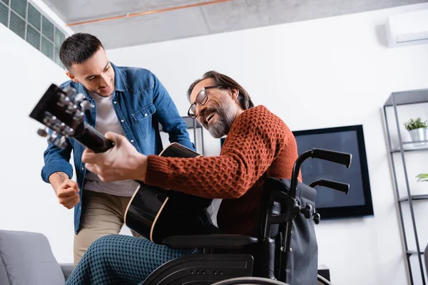 Low Angle View Cheerful Disabled Man Playing Guitar Excited Hispanic — Stock Photo, Image
