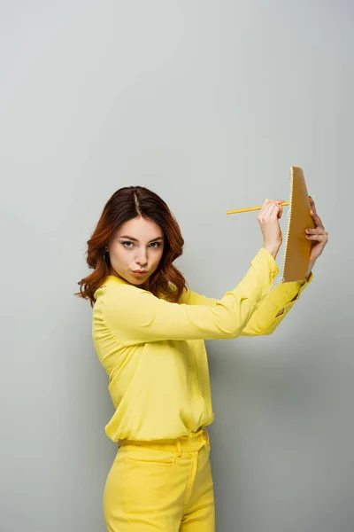 Serious Woman Looking Camera While Writing Notebook Grey — Stock Photo, Image