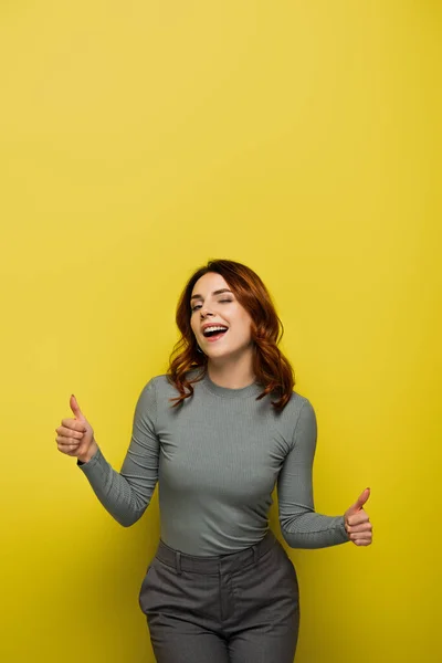 Positive Woman Curly Hair Showing Thumbs Yellow — Stock Photo, Image