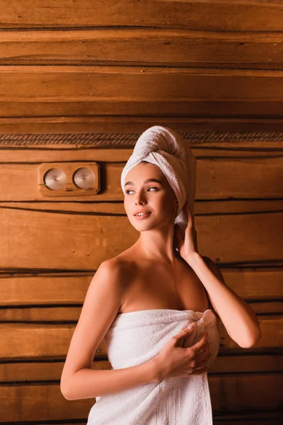 Smiling Woman White Towels Looking Away Wooden Sauna — Stock Photo, Image
