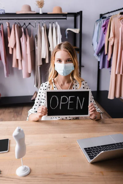 Showroom Owner Medical Mask Holding Board Open Lettering While Sitting — Stock Photo, Image
