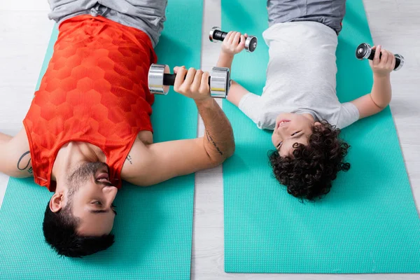 Top View Smiling Arabian Man Son Training Dumbbells Fitness Mats — Stock Photo, Image