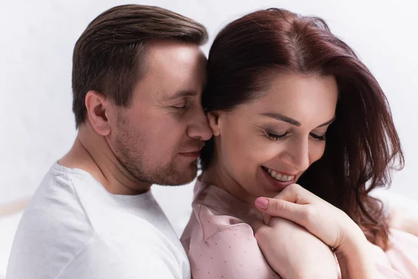 Man Embracing Cheerful Wife Closed Eyes Home — Stock Photo, Image