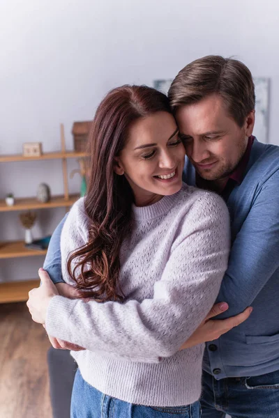 Adult Man Embracing Positive Wife Home — Stock Photo, Image