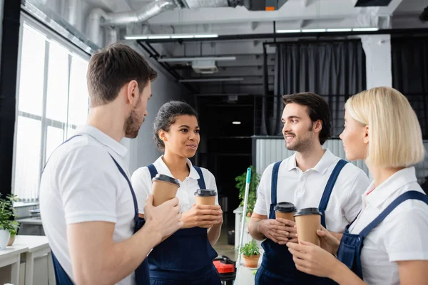 Smiling African American Cleaner Overalls Talking Colleagues Coffee Break Office — Stock Photo, Image