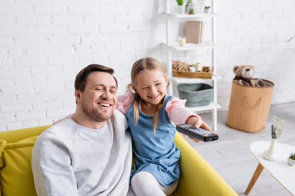 Cheerful Kid Clicking Channels Remote Controller While Watching Dad — Stock Photo, Image