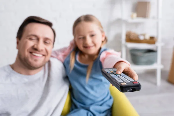 Selective Focus Remote Controller Hand Girl Watching Dad Blurred Background — Stock Photo, Image