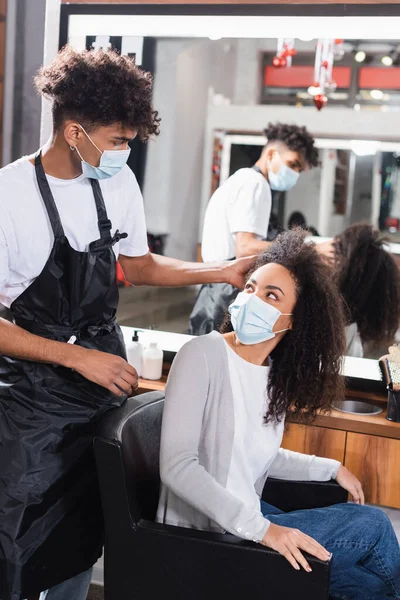 African American Hairdresser Touching Curly Hair Woman Chair Salon — Stock Photo, Image