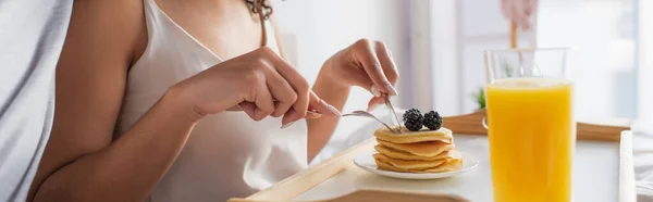 Cropped View African American Woman Holding Cutlery Pancakes Bedroom — Stock Photo, Image