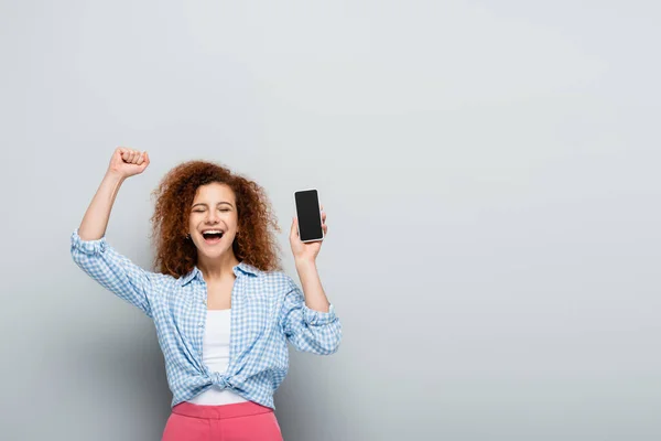 Cheerful Woman Closed Eyes Showing Rejoice Gesture While Holding Smartphone — Stock Photo, Image