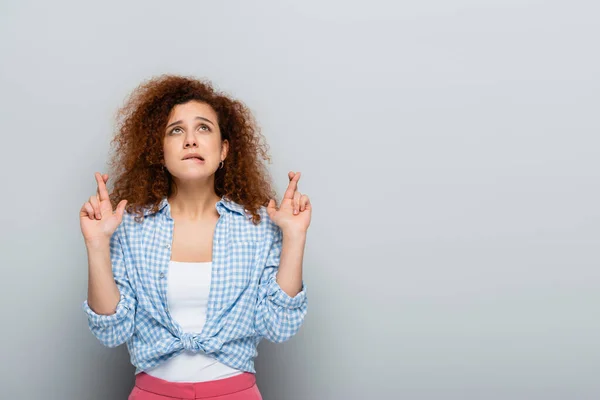 Worried Woman Plaid Shirt Looking While Holding Crossed Fingers Grey — Stock Photo, Image