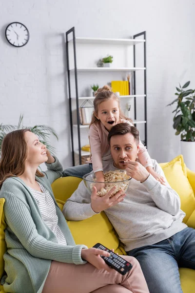 Man Holding Popcorn Daughter Wife Remote Controller — Stock Photo, Image