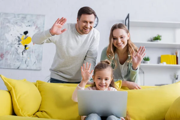 Smiling Kid Having Video Call Laptop Parents Blurred Background — Stock Photo, Image