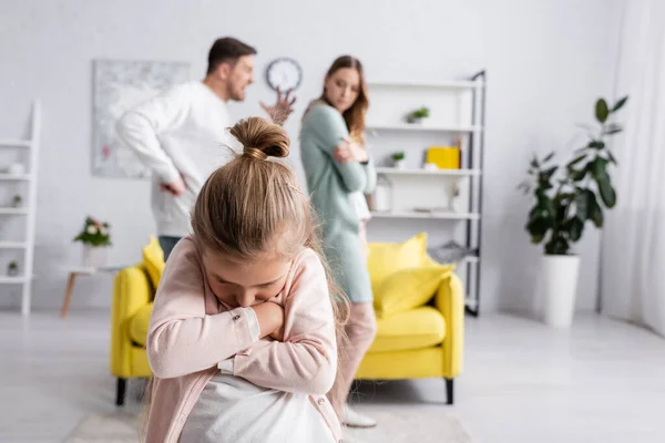 Displeased Kid Crossed Arms Standing Father Quarreling Mother — Stock Photo, Image