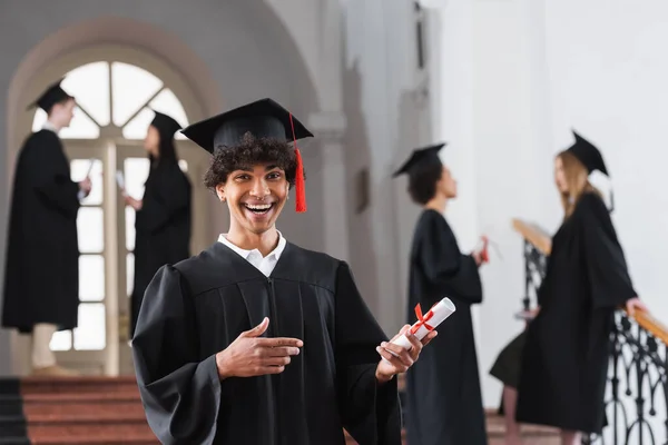 Excited African American Bachelor Pointing Diploma — Stock Photo, Image