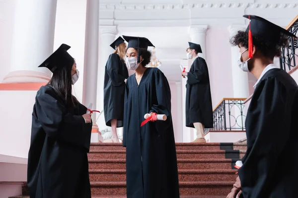 Multiethnic Graduates Medical Masks Talking University — Stock Photo, Image