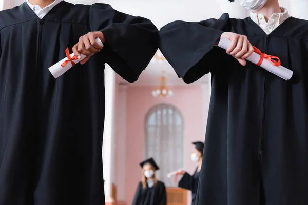 Cropped View Multiethnic Graduates Diplomas Doing Embow Bump — Stock Photo, Image