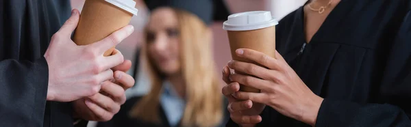 Cropped View Interracial Graduates Holding Coffee Banner — Stock Photo, Image
