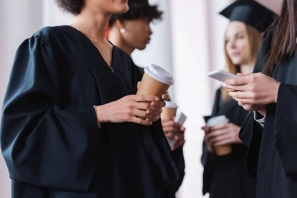 Multiethnic Graduates Holding Coffee Smartphone — Stock Photo, Image