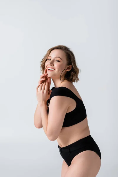 Jovem Mulher Com Sobrepeso Alegre Maiô Preto Isolado Branco — Fotografia de Stock