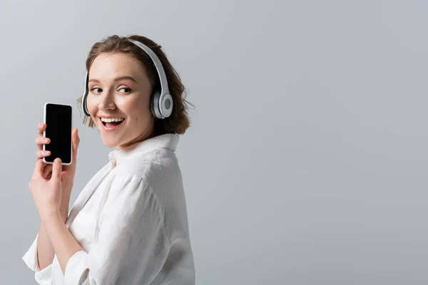 Happy Size Woman Wireless Headphones Listening Music Holding Smartphone Blank — Stock Photo, Image