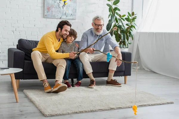 Cheerful Parents Child Playing Fishing Home — Stock Photo, Image