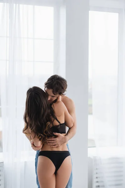 Young Man Hugging Brunette Girlfriend Lingerie — Stock Photo, Image
