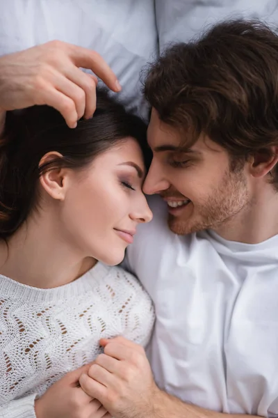 Top View Young Man Hugging Girlfriend Bed — Stock Photo, Image