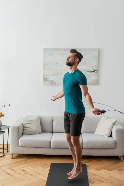 Full Length View Sportive Man Jumping Skipping Rope Home — Stock Photo, Image