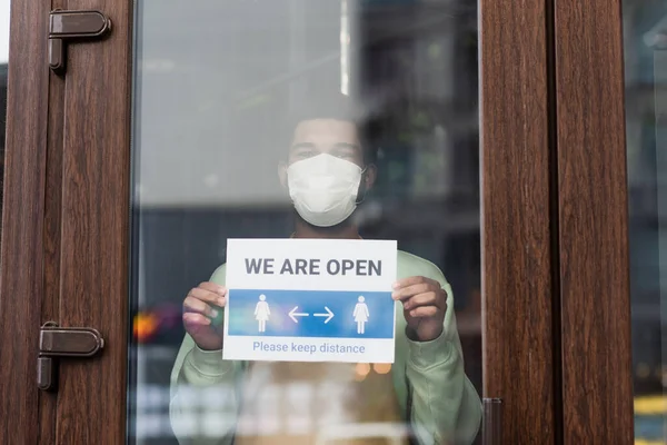 African American Barista Medical Mask Holding Signboard Open Lettering Door — Stock Photo, Image