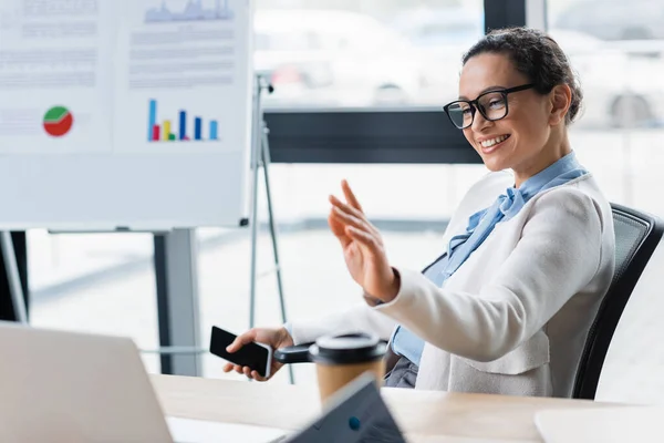 Positive African American Businesswoman Smartphone Having Video Call Laptop Office — Stock Photo, Image