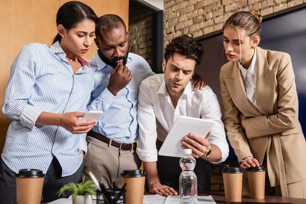 Serious Businessman Holding Digital Tablet Thoughtful Colleagues Meeting — Stock Photo, Image