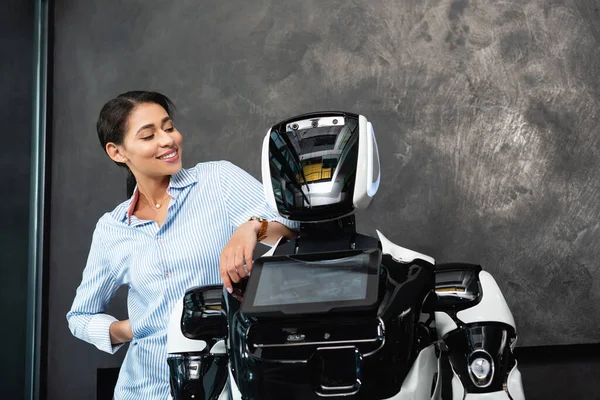 Cheerful African American Businesswoman Standing Hand Hip Robot — Stock Photo, Image