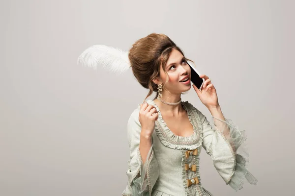 Dreamy Smiling Woman Retro Dress Touching Hair While Talking Cellphone — Stock Photo, Image