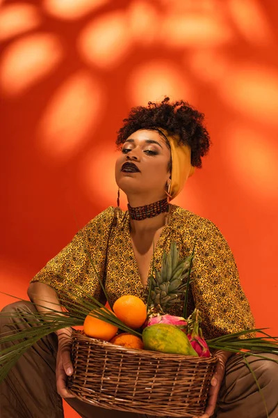 Confident Young African American Woman Holding Basket Exotic Fruits Orange — Stock Photo, Image