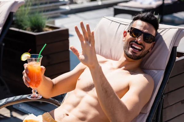 Happy Muslim Man Swimming Trunks Waving Hand Holding Cocktail Deck — Stock Photo, Image