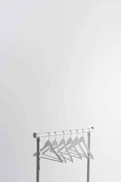 Collection White Hangers Garment Rack Isolated Grey — Stock Photo, Image