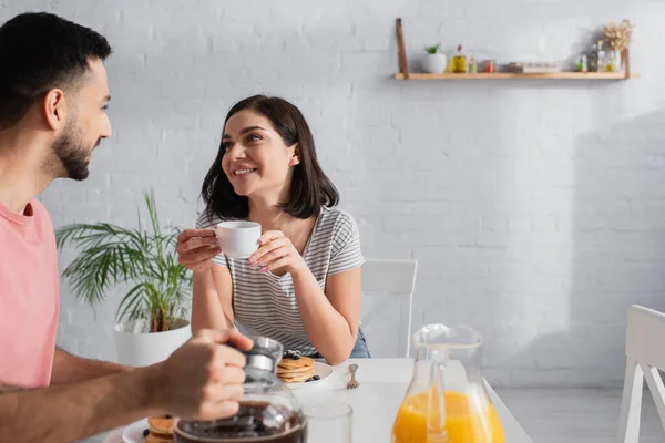 Smiling Young Woman Cup Hands Looking Boyfriend Holding Coffee Pot — Stock Photo, Image