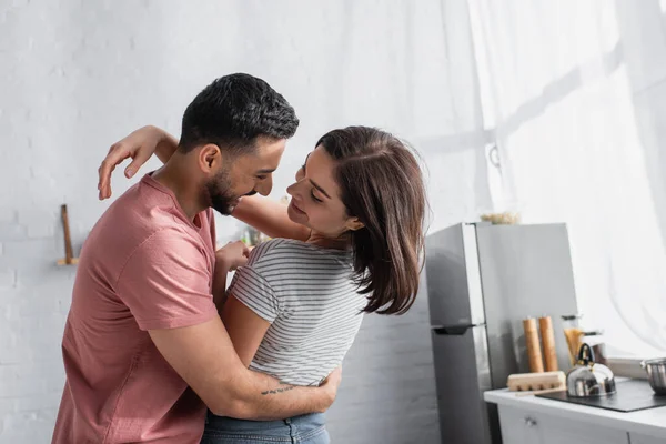 Smiling Young Couple Hugging Dancing Kitchen — 스톡 사진